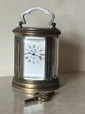 CARRIAGE  CLOCK  & KEY ( GWO) MINIATURE OVAL L’EPEE CARRIAGE CLOCK