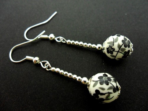 Pair dangly black white - of,
