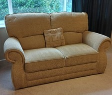 Three piece suite with 2-seater sofa and matching armchairs including a recliner