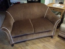 two seater settee used in good condition very neat can fit in a small room 