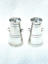 PAIR OF EDWARDIAN STERLING SILVER 'MILK CHURN' PEPPER SHAKERS.