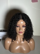 BRAZILIAN  REMY CURLY HUMAN