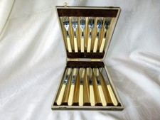 VINTAGE CHROME PLATED DINNER KNIVES AND FORKS