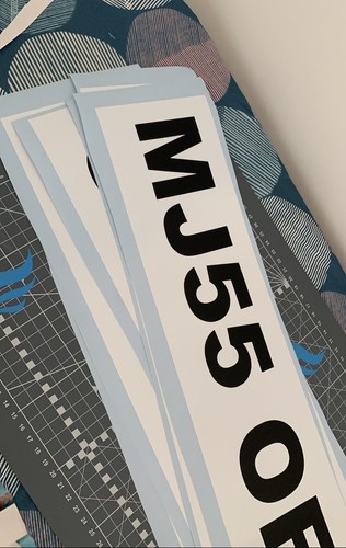 Front stick number plate - front, on