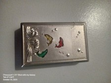 st dupont lighter with dolphin design. 