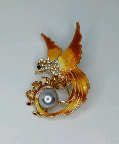 Gold tone phoenix style - tone,