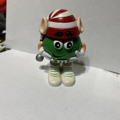 Green m candy - candy, holder
