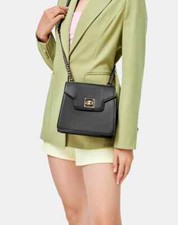 Stylized Lid Small Handbag