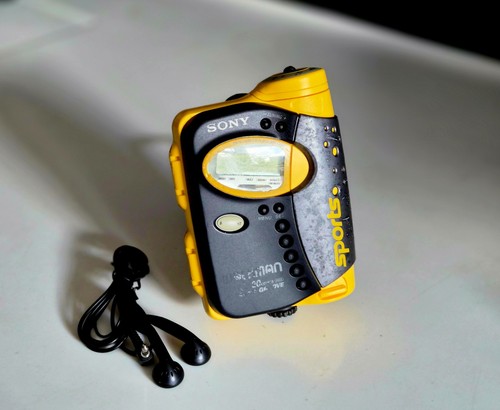 Sony sports yellow walkman - sony,