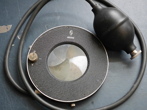 Front lens shutter suit - of,
