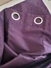 Purple eyelet lined curtains
