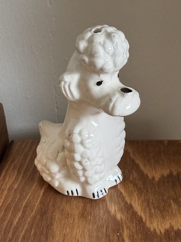 Vintage 1950s sitting white - sitting,