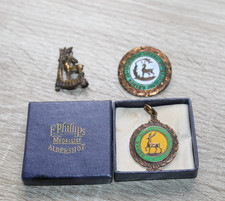 Three Vintage Metal Pin Badges
