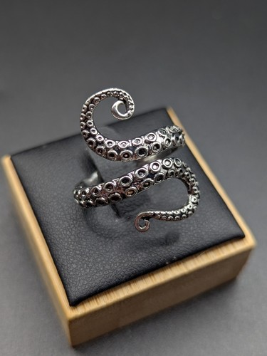 Silvery octopus tentacle - octopus,
