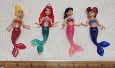 Lot of 4 Disney Polly Pocket