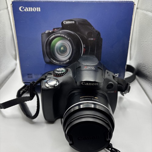Canon powershot is - canon, sx