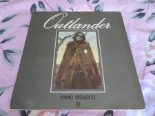 MEIC STEVENS - OUTLANDER - WARNER BROS. - [UK] (EX/VG)