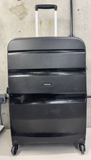 Dented american tourister - american,