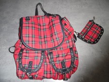 A STUDDED, RED TARTAN