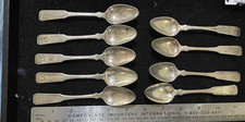 Set Of 9 Coin Silver Spoons
