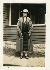 Woman Wearing Hat Dress Coat