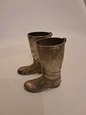 Stirrup cups, two metal riding