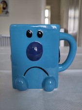 Mr. Grumpy blue cube character