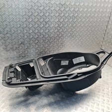 Seat shell helmet compartment