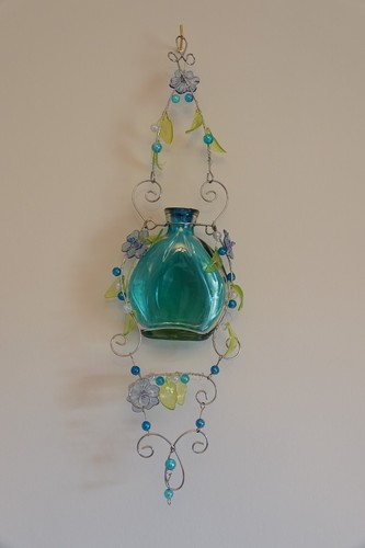 Hanging glass bottle