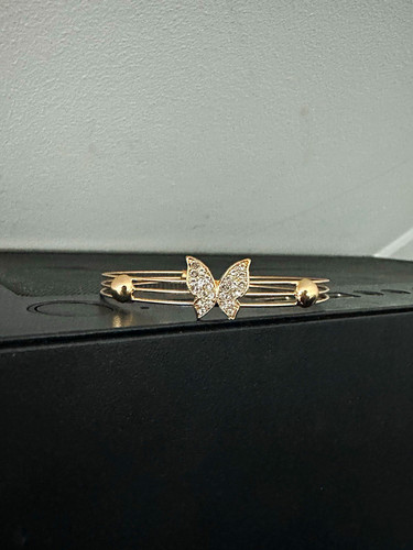 Gold tone metal open - tone, bangle