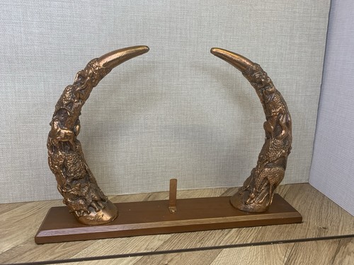 Pair carved art horns resin - of,