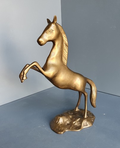 Vintage brass rearing stallion