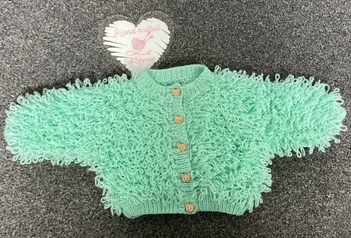 Hand knitted mint green baby - hand,