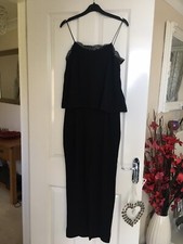 Stylish Zara black jumpsuit with lace front edging. Size S