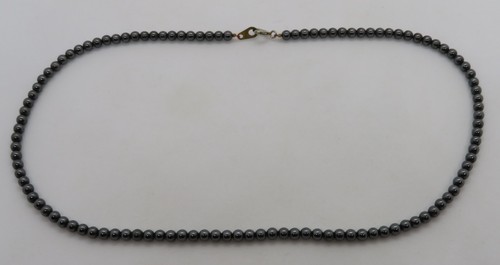 Stained purple cultured pearl