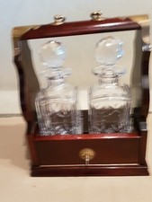 Pair of Collectable Cut glass Decanters in wooden tantalus.
