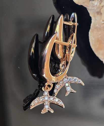 Gold tone black - gold, brooch