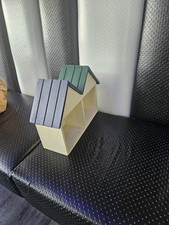 house shaped wooden display