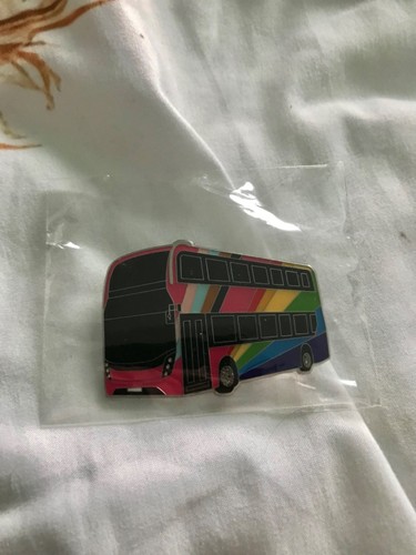 Uno pride bus badge - badge,