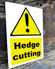 Caution Hedge Cutting, Metal