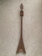 Flying V style strumming stick