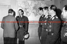 F027249 AH greets Adolf Galland Luftwaffe fighter pilots Wolfs Lair HQ 1944 WWII