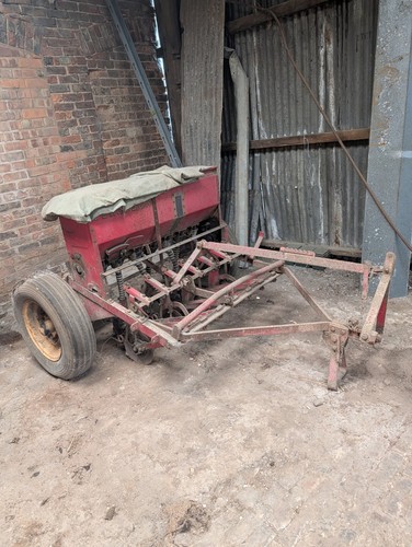 Vintage corn drill - corn,