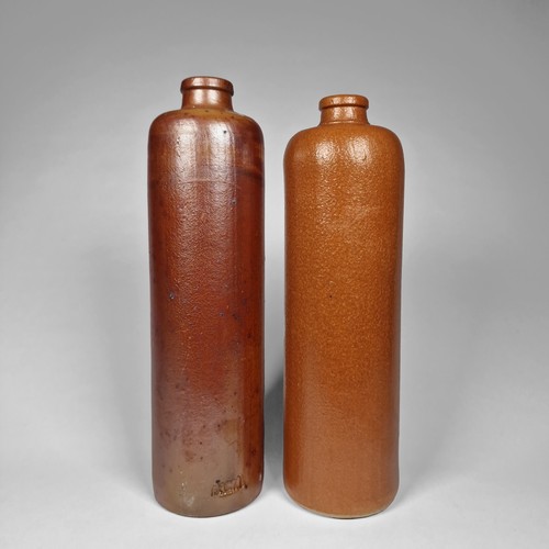 Two old stoneware gin bottles - two,