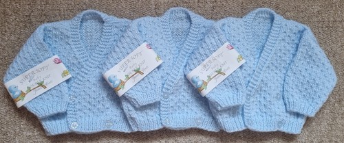 Hand knitted newborn - hand,