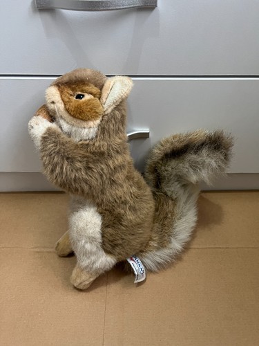 2010 hansa squirrel holding - squirrel,