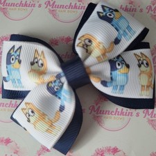 Handmade 4 inch blue dog character bow 
