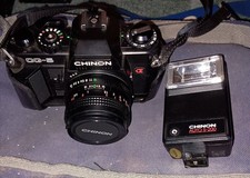 Chinon CG-5  35mm SLR Film Camera with 2x lenses, manual, flash and padded case.