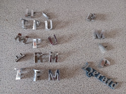 Triumph badge letters - letters, herald