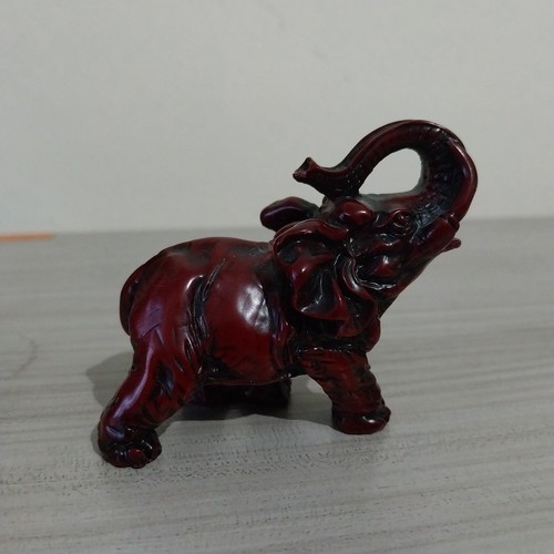 Red resin elephant figurine - resin,